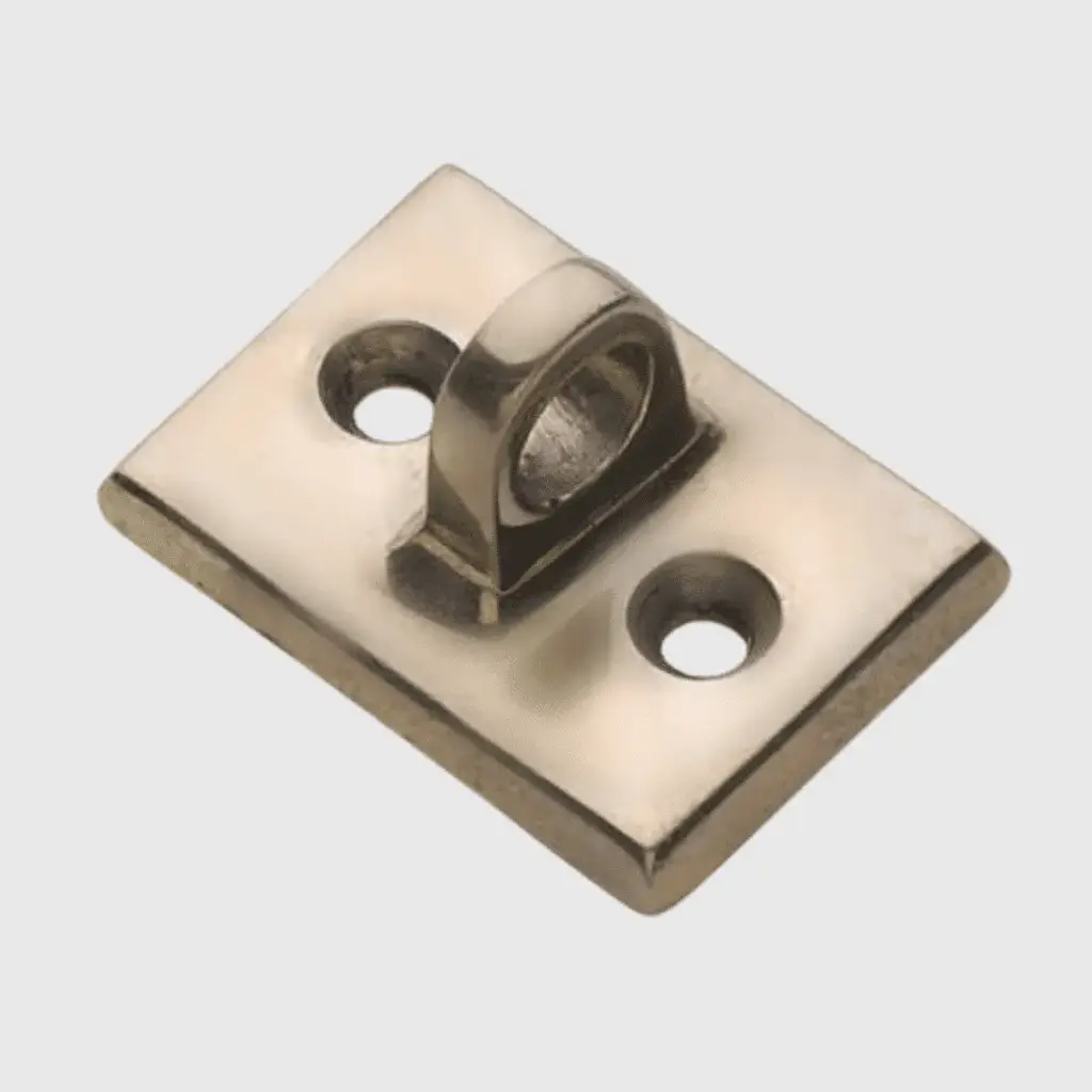 Seinäkiinnike, messinki