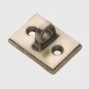 Seinäkiinnike, messinki